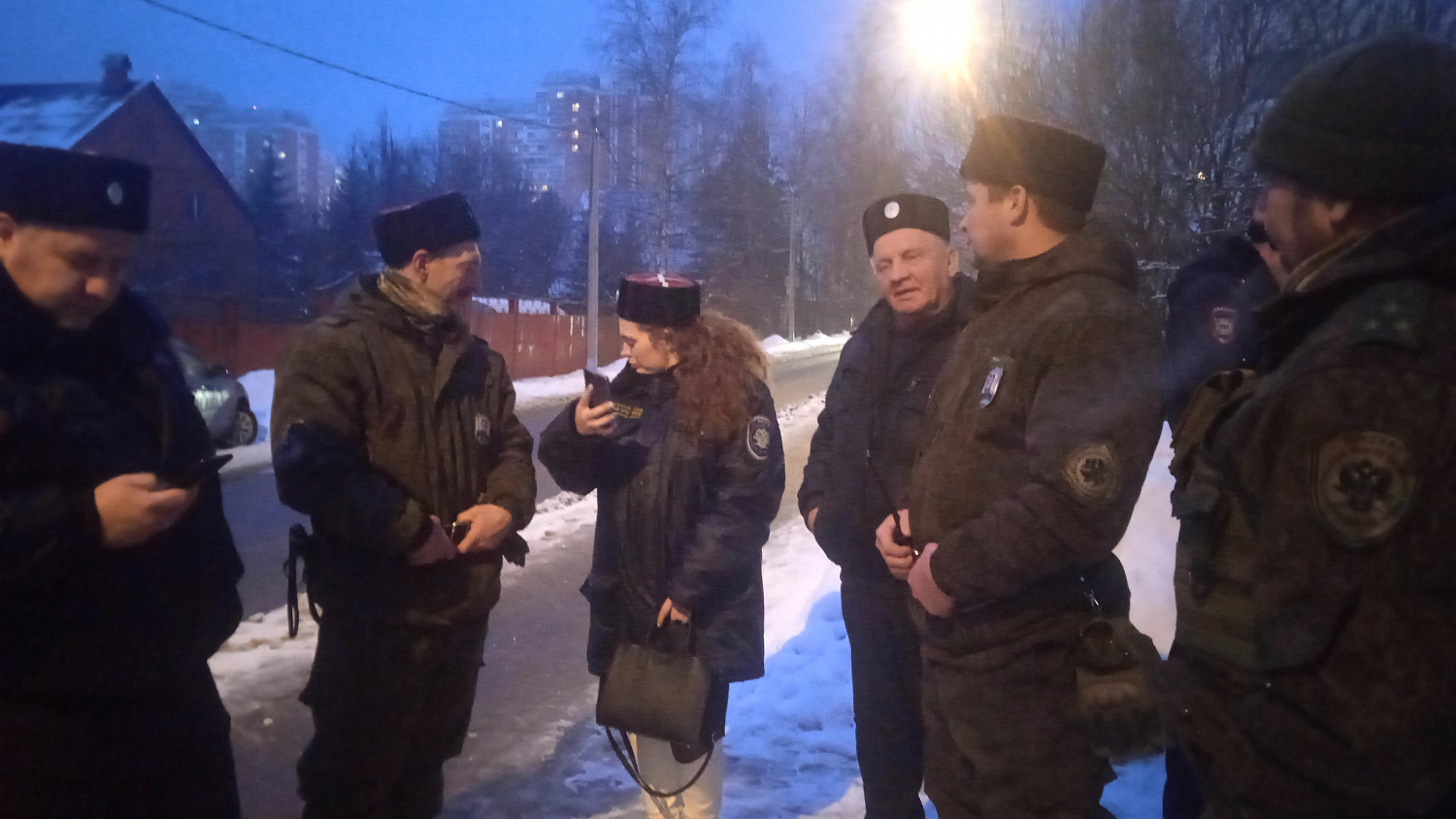 Под охраной казаков